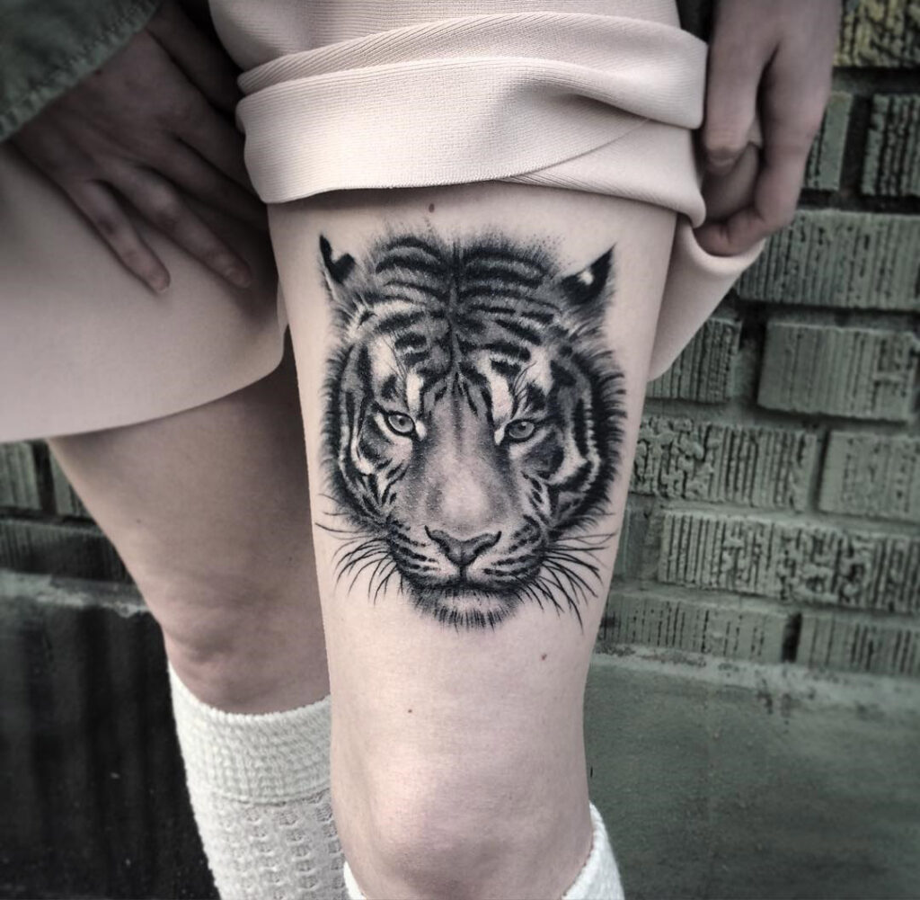 tiger tattoo on thigh